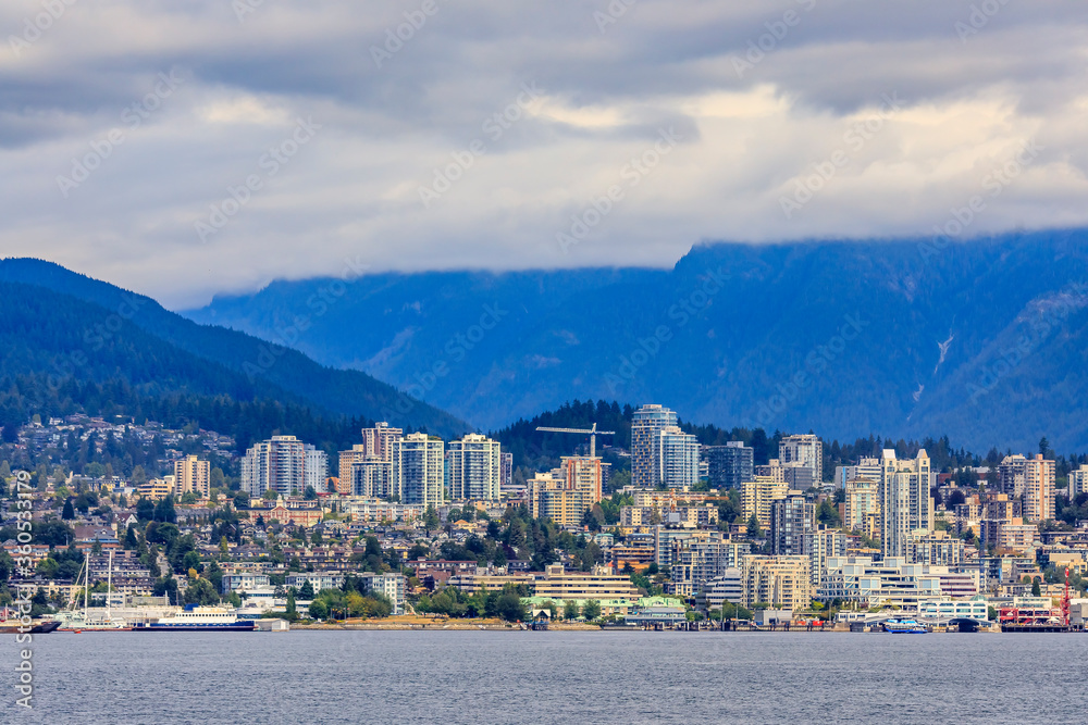 Vancouver North Shore skyline and waterfront with Grouse mountain in British Columbia Canada