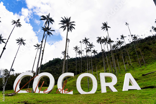 COCORA VALLEY, COLOMBIA - NOV 14, 2019: Cocora Valley sign on one of the trails in the park, Colombia, South America. photo