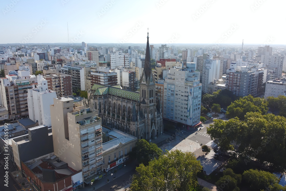 Obraz premium Aerial view by drone of Cathedral of Mar del Plata or The Cathedral Basilica of Saint Peter and Cecilia - Roman catholic church located near San Martin square in Mar del Plata, Argentina