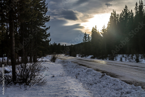 Sun peaking through the clouds. Waiprous Creek Provincial Recreation Area, Alberta, Canada photo