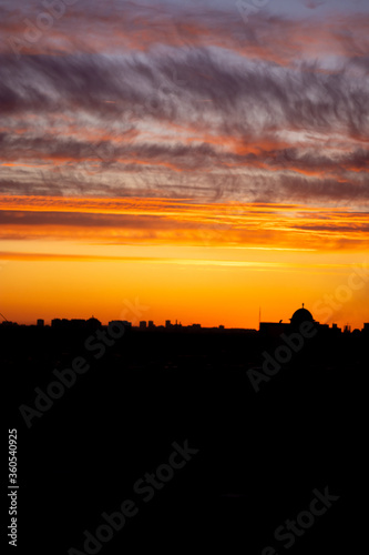  Sunset in the city, view from a high floor © Kseniya