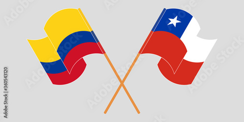 Crossed and waving flags of Colombia and Chile