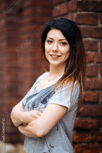 girl in a gray T-shirt smiling in the city © ostap_davydiak
