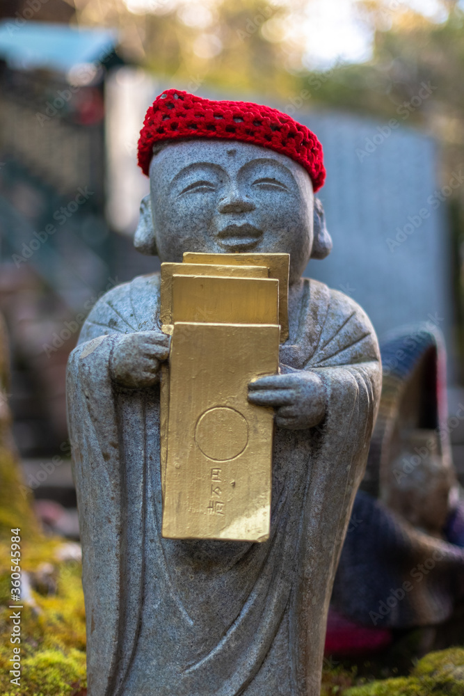 Jizo buddha statue with red cap at Daishoin Temple, Miyajima, Japan