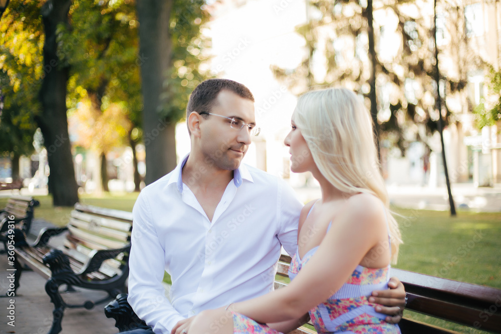 Naklejka premium Beautiful couple in love dating outdoors and smiling