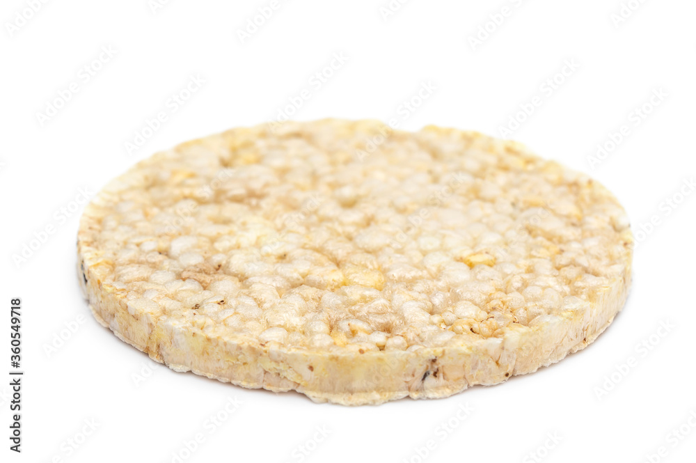 Round diet rice bread on white. Healthy eating. Round diet rice bread on white. Healthy eating.