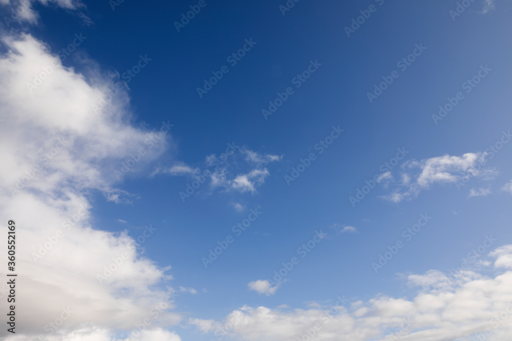 Blue sky with white clouds around