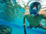 man snorkeling in the sea. underwater