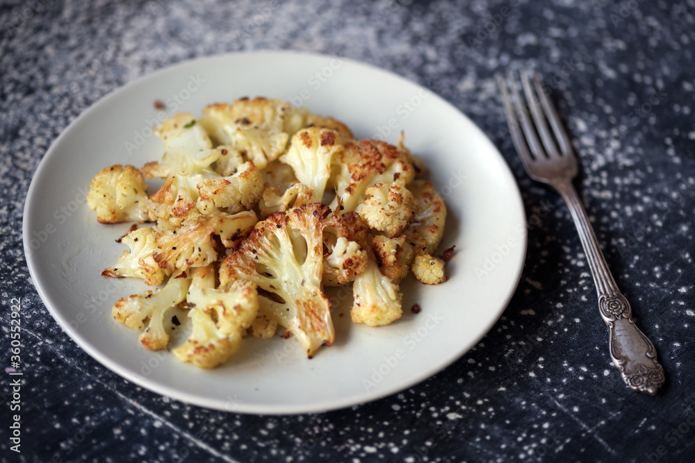cauliflower in at the wooden table cauliflower in at the wooden table