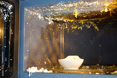Incorrectly cooked egg in the microwave. The egg exploded