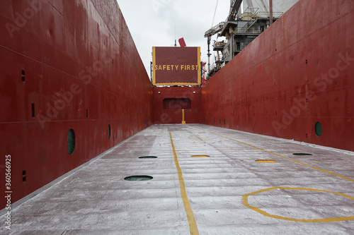 Inside empty cargo hold of general cargo ship