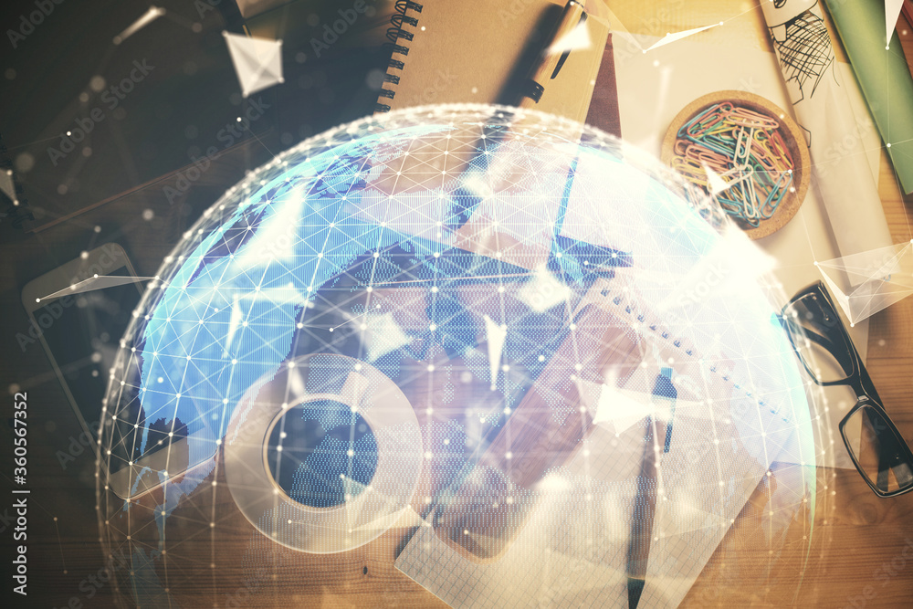Multi exposure of business theme drawing and work table top veiw. Concept of international finance. Multi exposure of business theme drawing and work table top veiw. Concept of international finance.