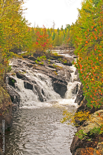 Hidden Waterfall in the Fall in the North Woods