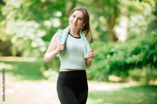 young sexy girl goes in for sports in nature