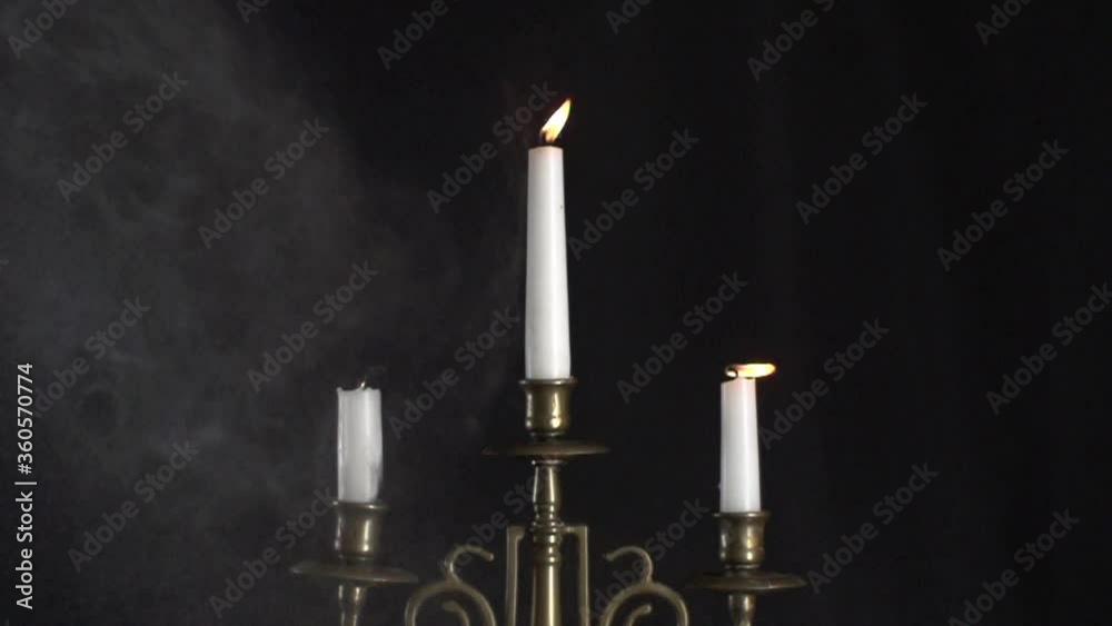 burning magic candle for the ritual of the death of black magic of a psychic burning magic candle for the ritual of the death of black magic of a psychic