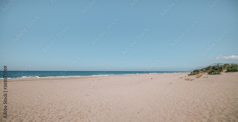beautiful sandy beach and turquoise sea at sunny day Patara beach, Antalya Turkey