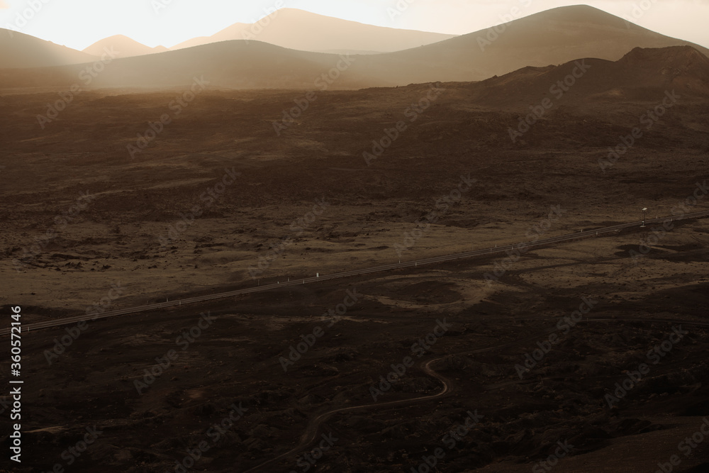Fototapeta premium sunset road mountains