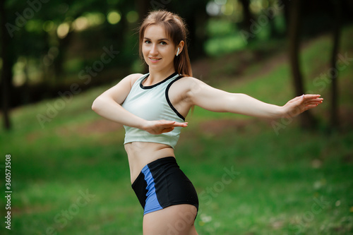 A young woman is engaged in sports, a healthy lifestyle,