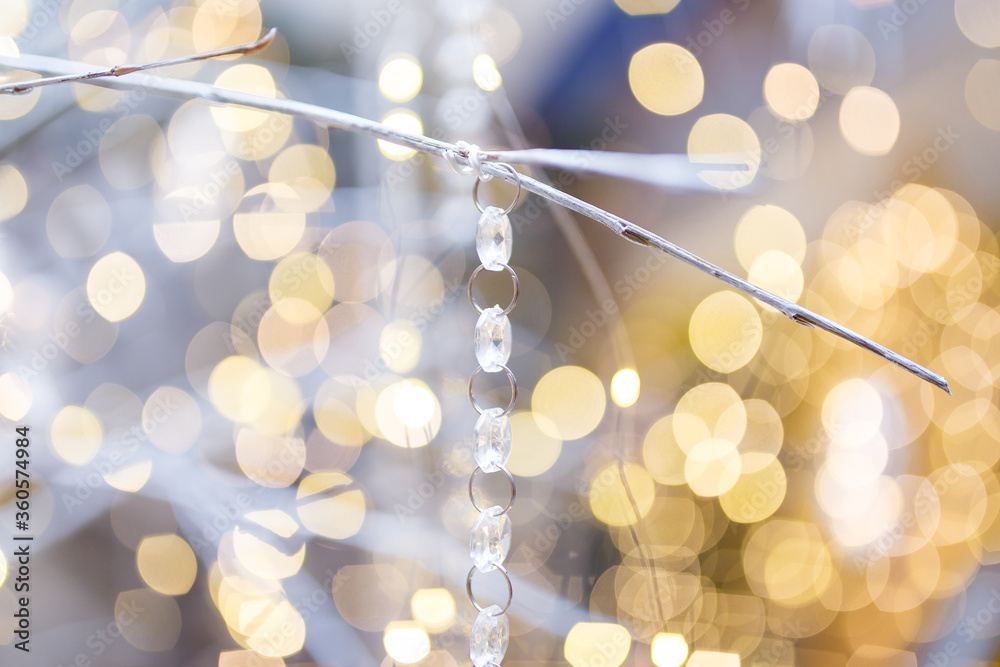 Unfocused shot of Christmas background. Shiny sparkling garland lights and bokeh. Copy space. Unfocused shot of Christmas background. Shiny sparkling garland lights and bokeh. Copy space.