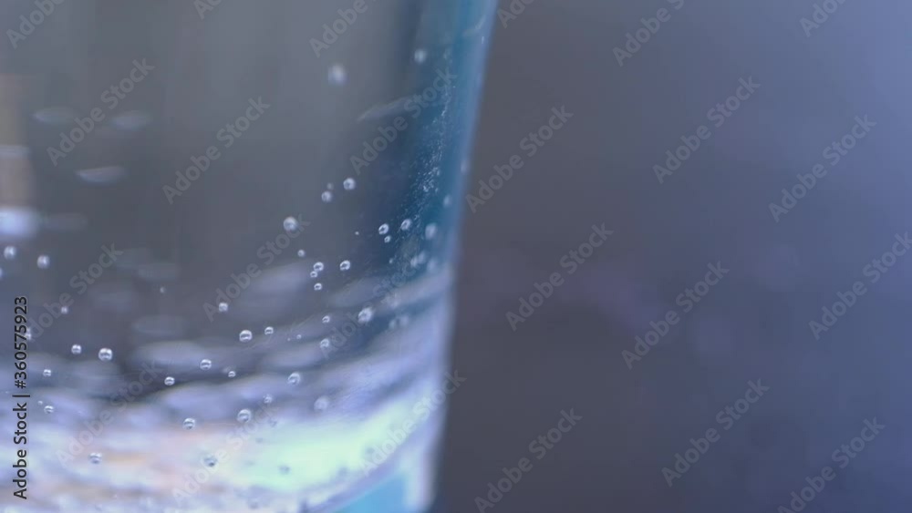 Close up background of Bubble soda water in glass with slow motion. Close up background of Bubble soda water in glass with slow motion.