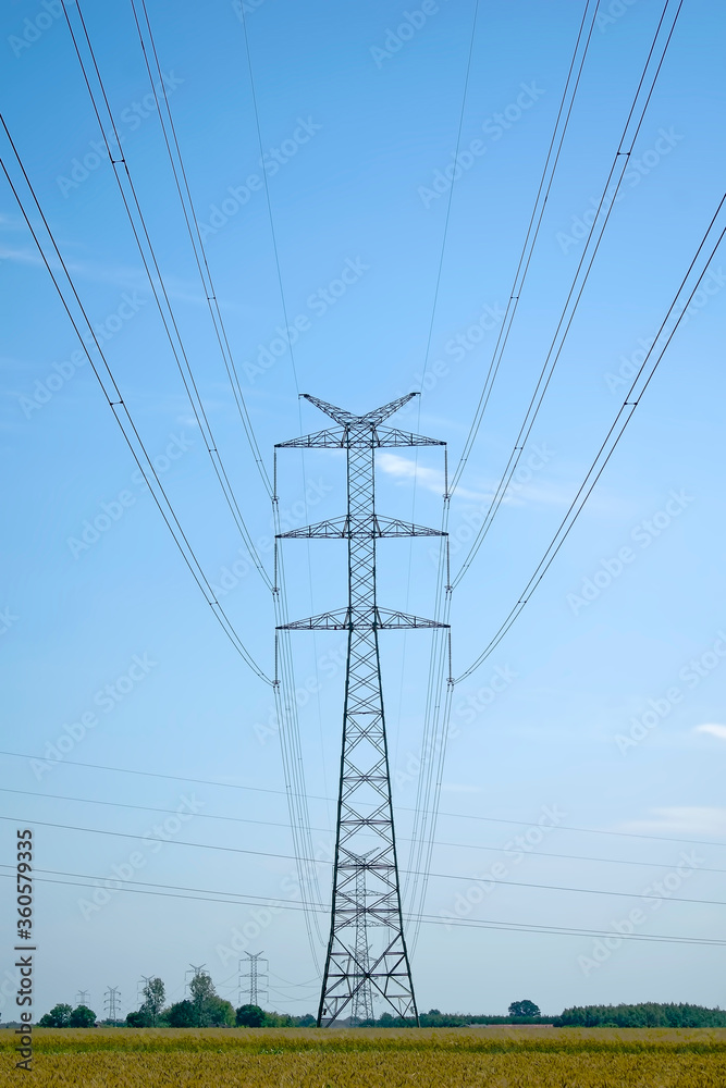 Fototapeta premium High voltage lines outside the city