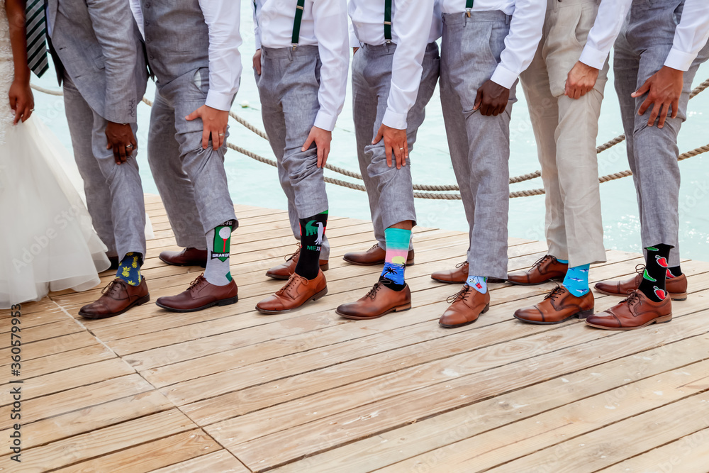 Groomsman team group showing colorful different socks. Groom and friends in  bright, vintage, brown shoes. Fashion, style, beauty. Stock Photo | Adobe  Stock