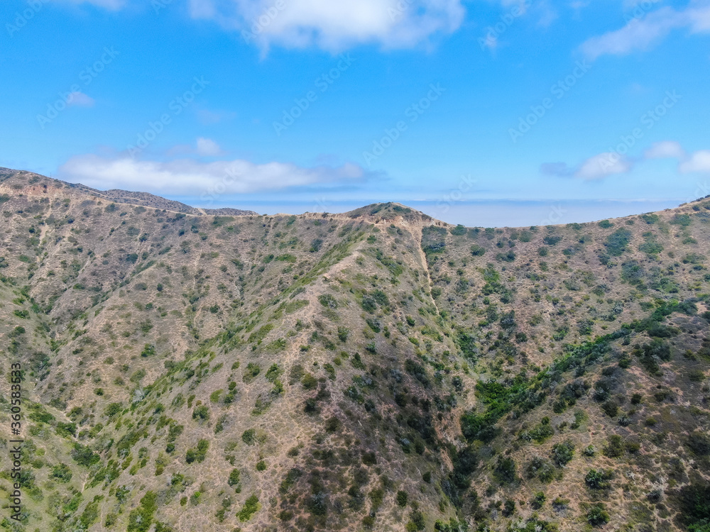 Aerial view Santa Catalina Island mountain peaks with blue sky. California, USA