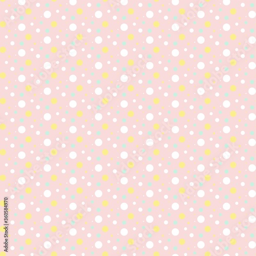 ピンク背景のランダムなドットパターン シームレス