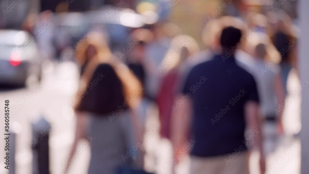 New York City busy sidewalk, anonymous people walk, sunny summer day, blur
New York City busy sidewalk, anonymous people walk, sunny summer day, blur