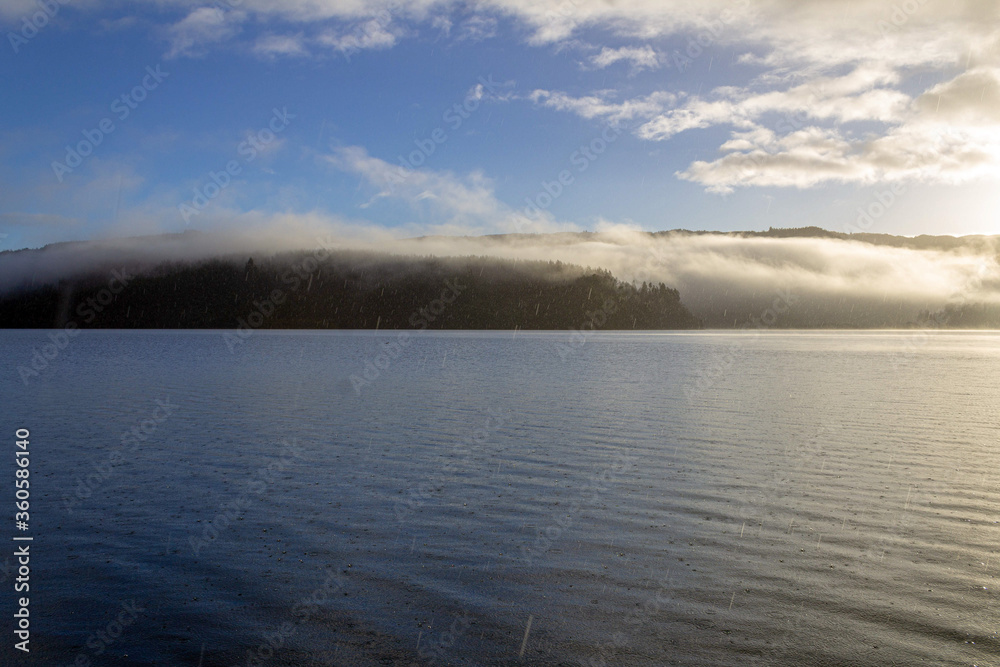 Obraz premium cloud over the lake