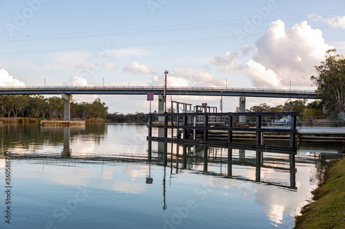 The Berri bridge and water treatment plant with calm river murray located in the river land at Berri South Australia on 20th June 2020 photo