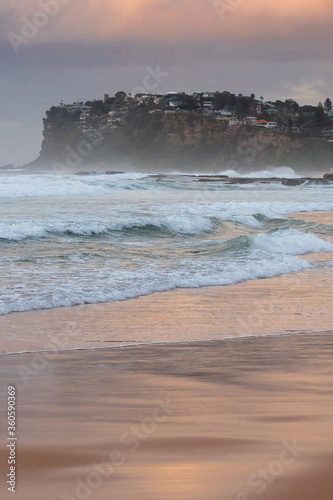 Golden sunrise glow at a beach in Australia photo