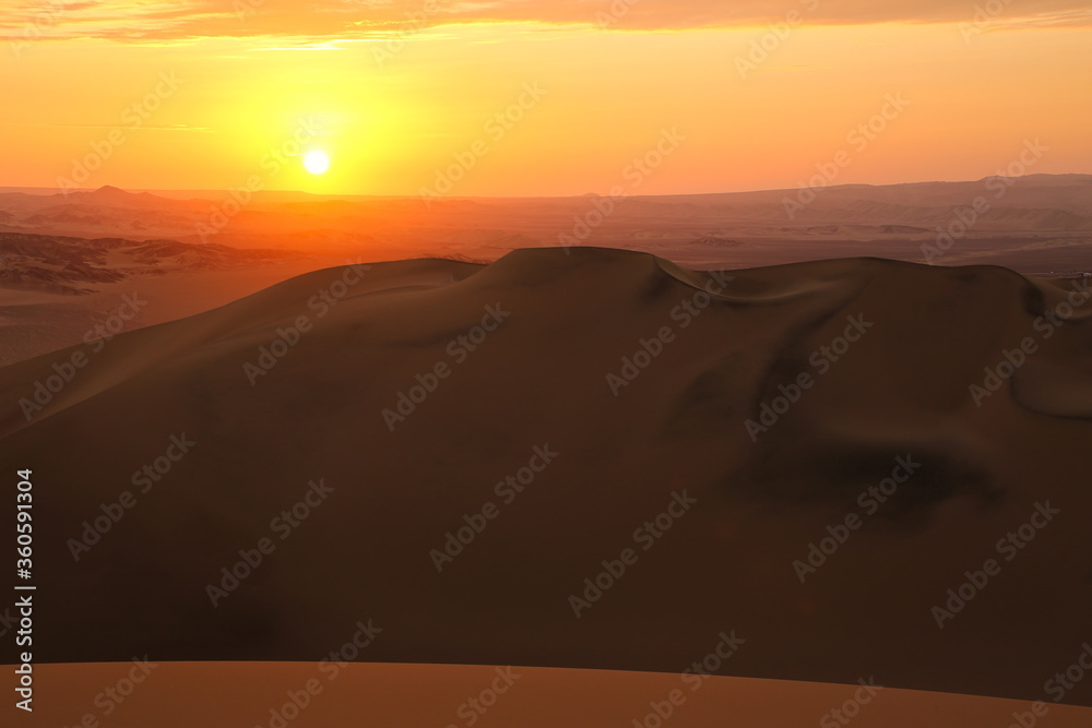 Sand dunes near Huacachina at sunset, Ica region, Peru. Sand dunes near Huacachina at sunset, Ica region, Peru.