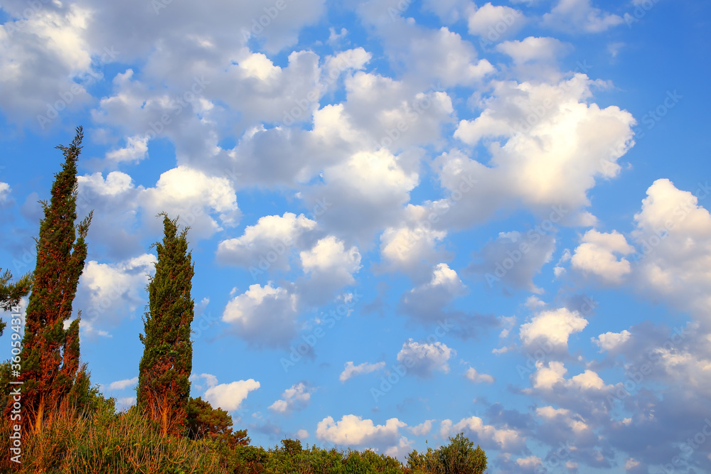 White clouds above the hill in Korcula town, Croatia White clouds above the hill in Korcula town, Croatia