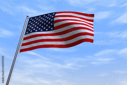 CGI isolated USA flag waving on a blue sly - close up of United States of America national flag flowing in the wind in US American democracy and freedom concept