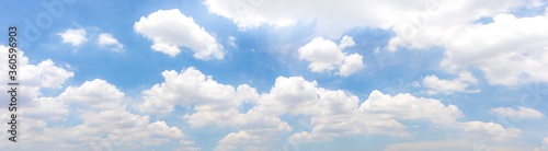 Panorama or panoramic photo of blue sky and white clouds or cloudscape. for breathing concepts background.