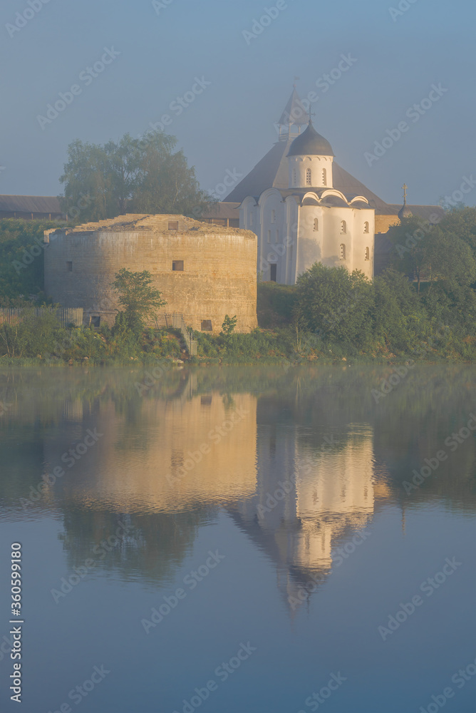 St. George Church in the Old Ladoga Fortress in the morning June fog. Leningrad region, Russia