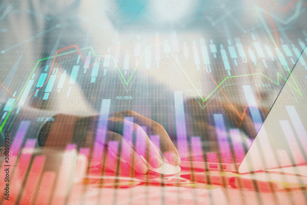 Double exposure of forex graph with man working on computer on background. Concept of market analysis. Double exposure of forex graph with man working on computer on background. Concept of market analysis.