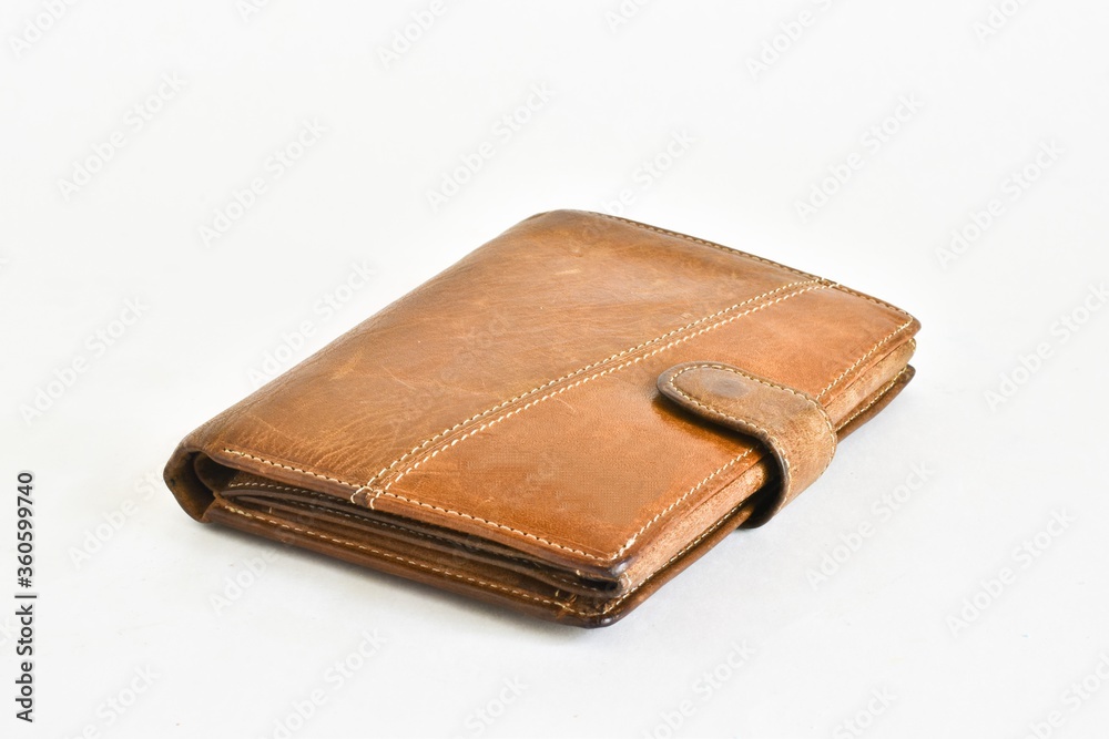 Old leather wallet isolated on a white background. Old leather wallet isolated on a white background.