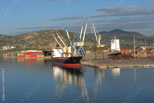 
6/21/2020 Greece, Volos, commercial port east of the sun