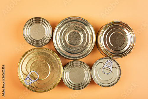 Donation bag with various food on orange background with copy space. Flat lay. top view, Mockup. Food donations or food delivery service concept. Online shopping during coronavirus covid-19 lockdown.