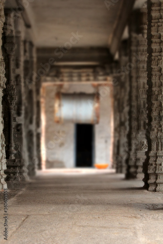 Blured images of old Hindu temple with carving on pillars © jayantilal