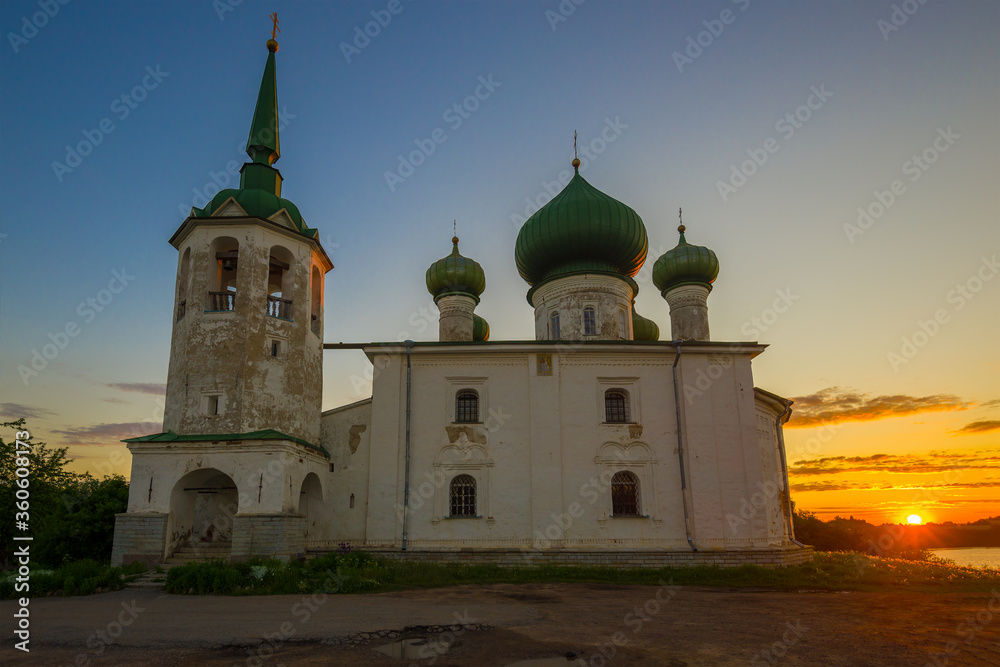 Old Church of the Nativity of John the Baptist close-up against the background of the June dawn. Staraya Ladoga, Russia