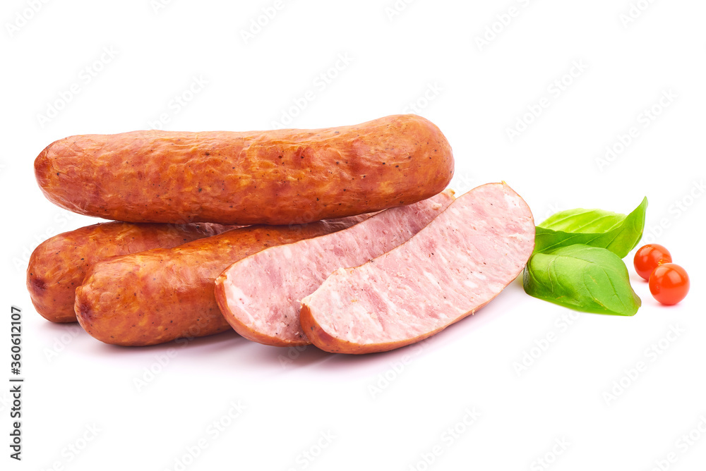 Sliced Oktoberfest Dried Sausages with basil leaves, isolated on a white background. Close-up Sliced Oktoberfest Dried Sausages with basil leaves, isolated on a white background. Close-up
