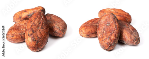 dried unpeeled cocoa beans isolated on white background