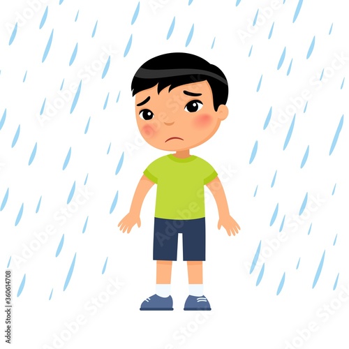 Unhappy boy under rain flat vector illustration. Sad preteen child in bad rainy weather. Asian kid with dark hair getting wet under downpour. Isolated cartoon character on white background