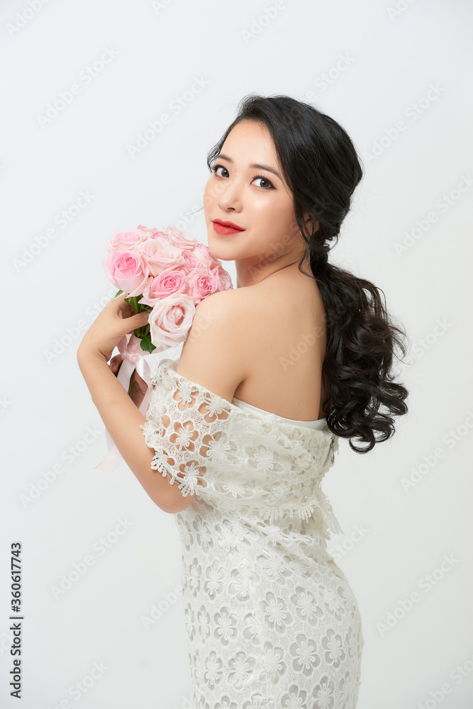 Beautiful Asian Girl in Wedding Dress and Flower Bouquet, copy space Beautiful Asian Girl in Wedding Dress and Flower Bouquet, copy space