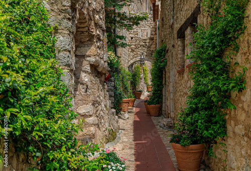 Fototapeta Naklejka Na Ścianę i Meble -  Old buildings on narrow streets in the medieval city of Eze Village in the South of France along the Mediterranean Sea
