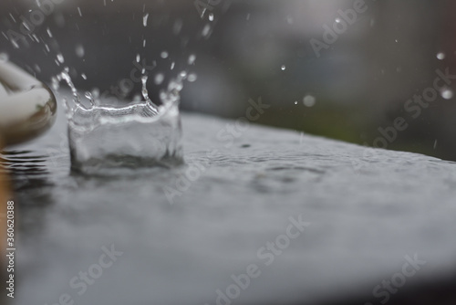 Beautiful monsoon water drops on a floor with shallow depth of field, Indian Monsoon 