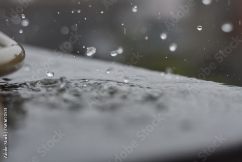 Beautiful monsoon water drops on a floor with shallow depth of field  Indian Monsoon 